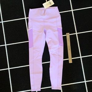 Brand new with tags Fabletics The On-the-go Legging Short in purple lavender